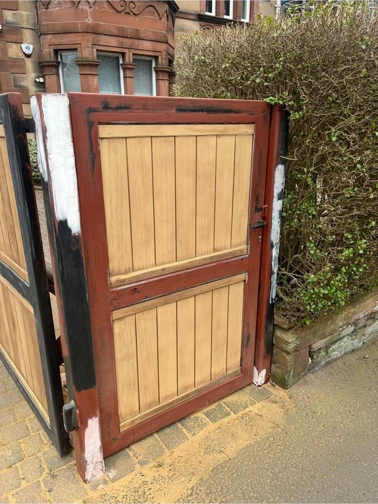 Gate stripped back to timber mid-refurbishment