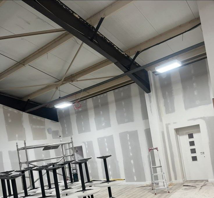Commercial hall with walls taped and jointed