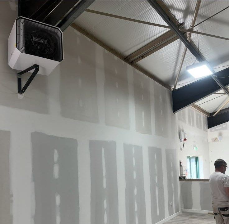 Taping and jointing high walls in a commercial unit